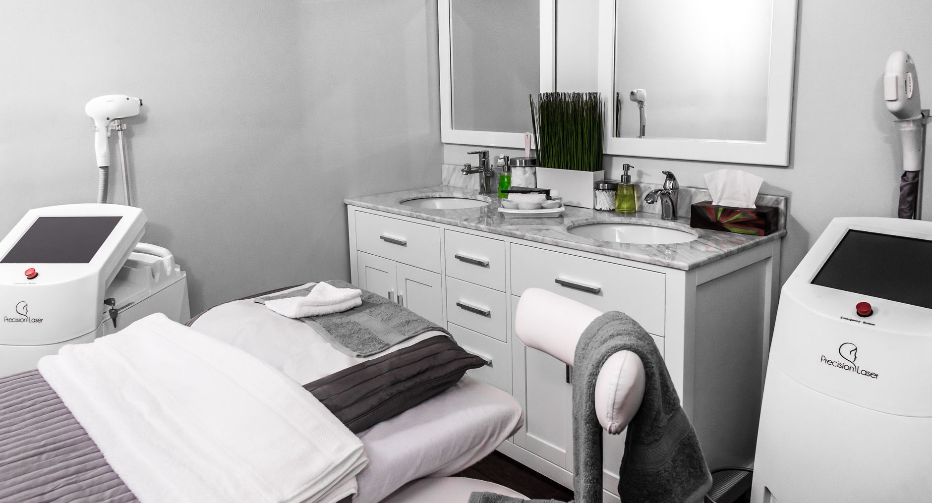 Aesthetician greeting a patient at a calm, modern med spa reception